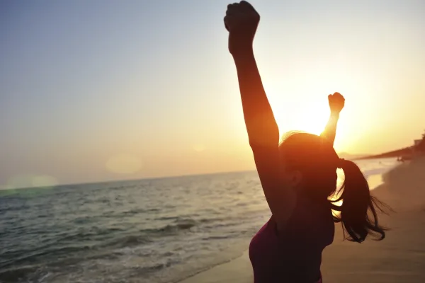 woman-beach-sunset